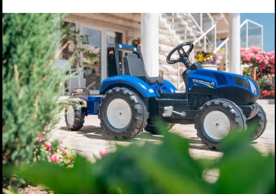 New Holland pedal tractor with trailer