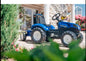 New Holland pedal tractor with trailer